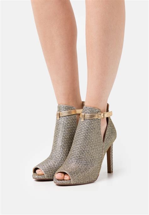 michael kors ankle boot with gold buckles|michael kors ankle boot poshmark.